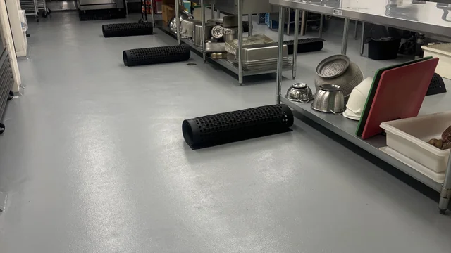 Commercial kitchen epoxy floor after janitorial cleaning